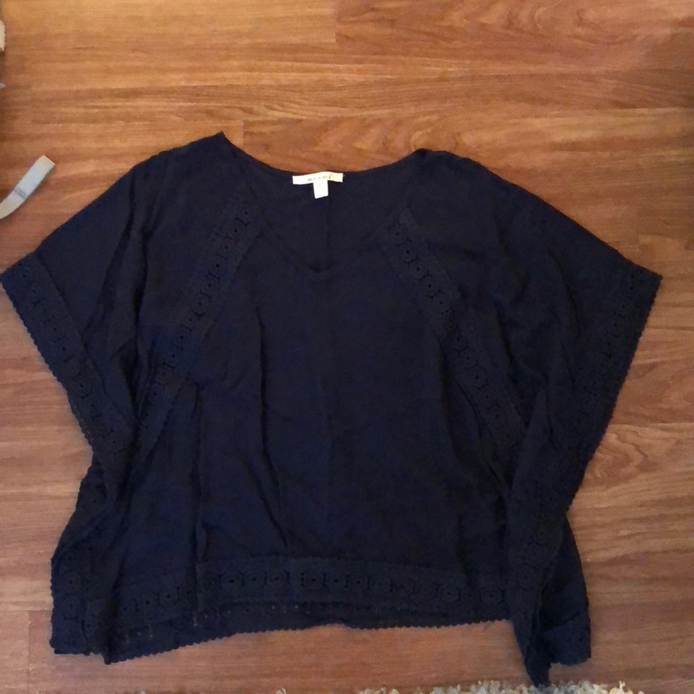 Francesca’s navy blue oversized shirt size XS.